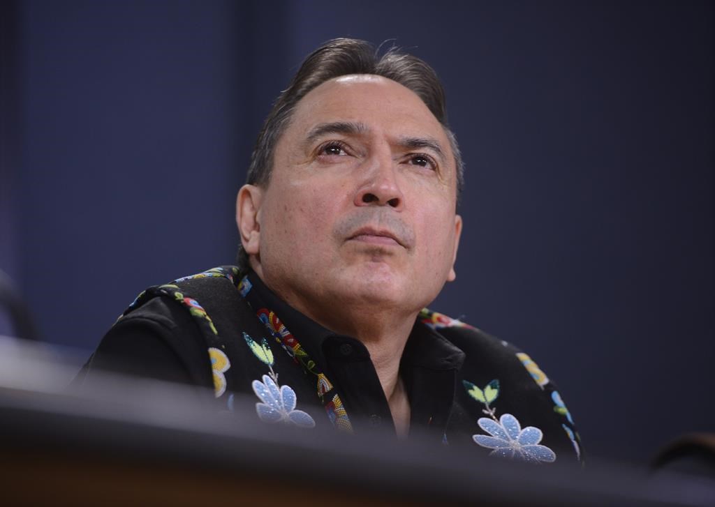 Assembly of First Nations National Chief Perry Bellegarde says work on First Nations policing should have started "a long time ago." National Chief Perry Bellegarde is joined by First Nations leaders during a press conference at the National Press Theatre in Ottawa on Tuesday, Feb. 18, 2020.