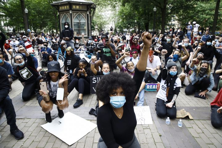Demonstrators chant Tuesday, June 2, 2020, at Rittenhouse Square in Philadelphia, during a protest over the death of George Floyd, who died May 25 after he was restrained by Minneapolis police.