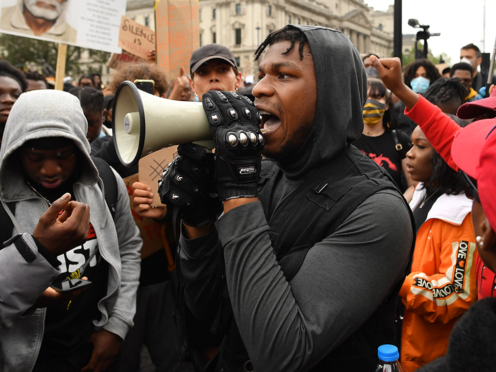 John Boyega speaks to the crowd during a Black Lives Matter protest in Hyde Park on June 3, 2020 in London, England.