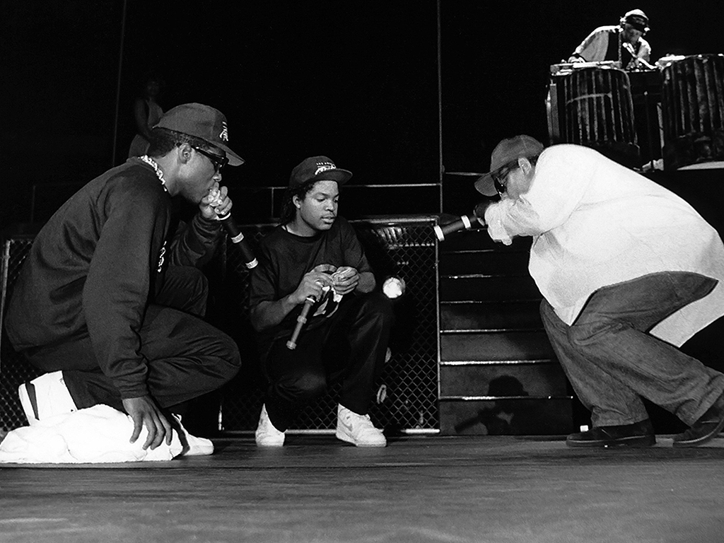 (L-R) MC Ren, Ice Cube and Eazy-E. from N.W.A. perform during the ‘Straight Outta Compton’ tour at Kemper Arena in Kansas City, Mo., in 1989.
