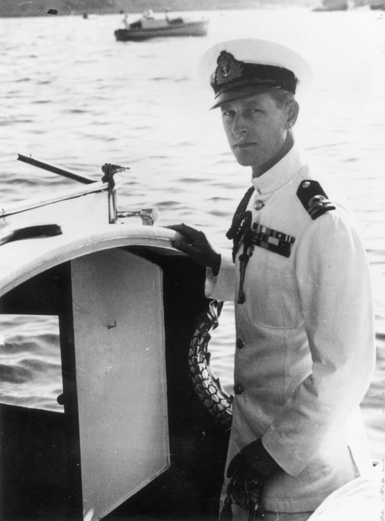 Prince Philip, Duke of Edinburgh in naval uniform on a boat in Malta in 1949.
