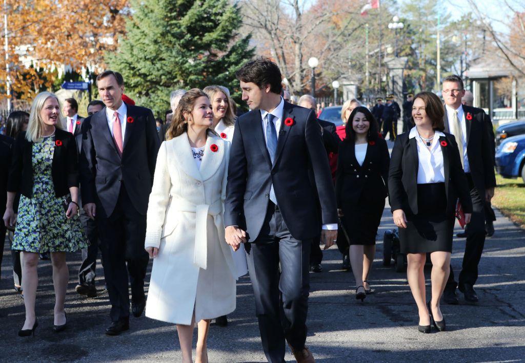 Incoming Canadian Prime Minister Justin Trudeau and his wife Sophie Gregoire, wearing a Sentaler coat, arrive with his cabinet before his swearing-in as Canada’s 23rd prime minister at Rideau Hall in Ottawa on Nov. 4, 2015.