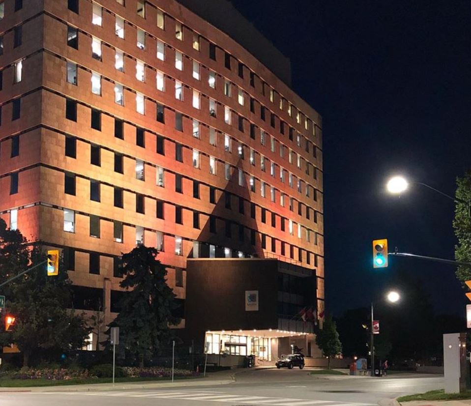London City Hall is lit up in gold to recognize local graduates.