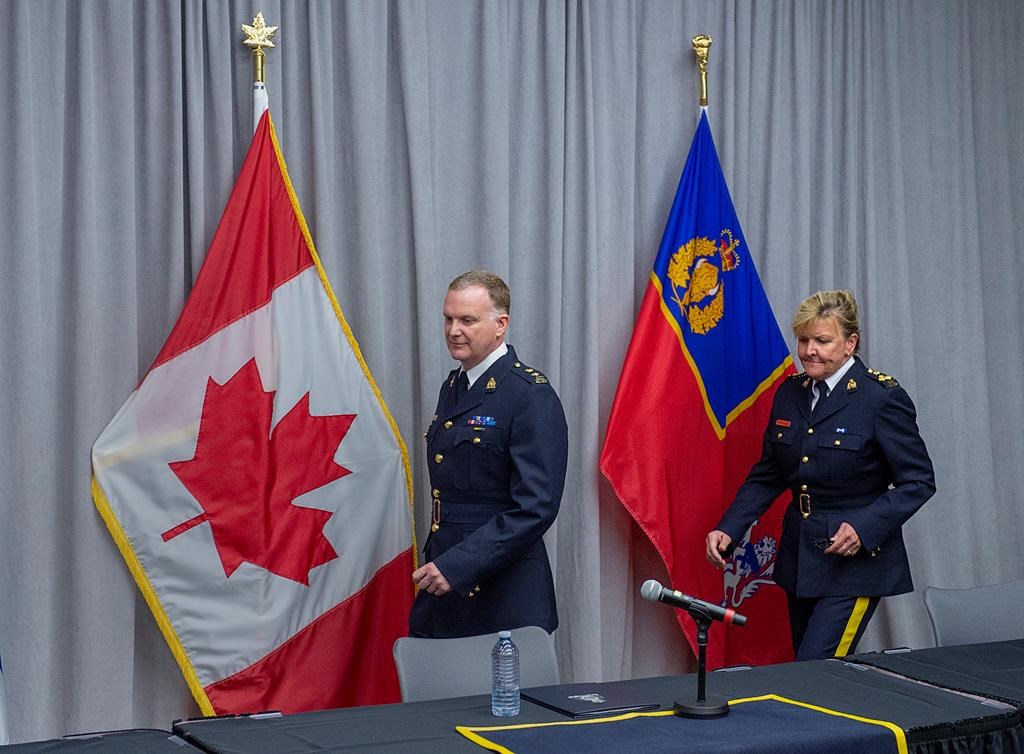 RCMP Supt. Darren Campbell, left, and Assistant Commissioner Lee Bergerman arrive at an media update of the investigation of the Nova Scotia shootings at RCMP headquarters in Dartmouth, N.S., Thursday, June 4, 2020.