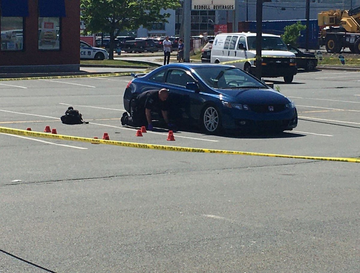 Halifax police attend the scene of a shooting in a parking lot on Kempt Road on Tuesday, June 23, 2020. 