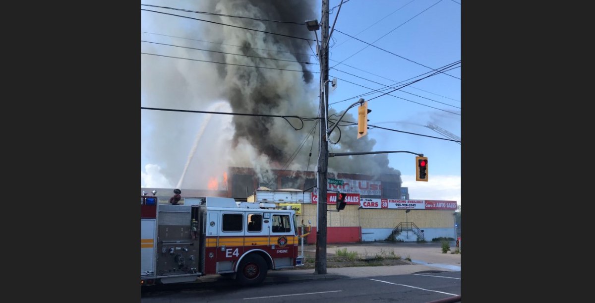Fire crews are on the scene of a large commercial fire in Hamilton.