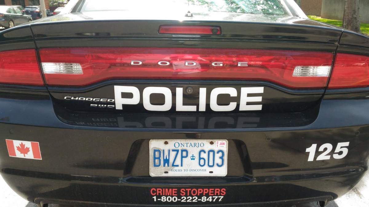 An arrest has been made by Hamilton Police, after a man was seen licking his hands and touching computers in a local store.