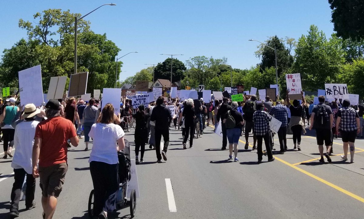A large group of anti-Black racism protests head to Hamilton city hall on Saturday, June 13, 2020.