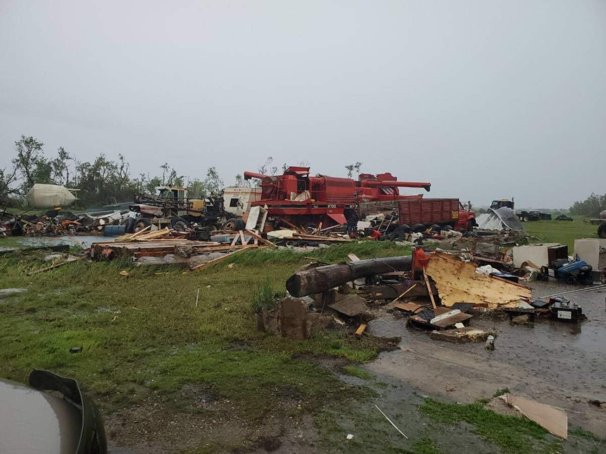 The buildings housing these vehicles were destroyed south of Rapid City, Man. on Sunday.