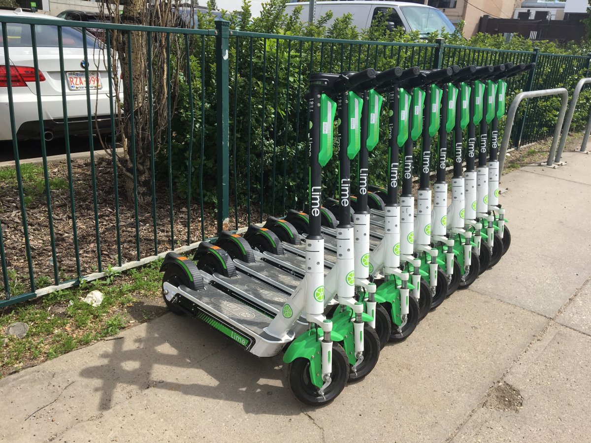 Lime electric scooters spotted on Whyte Avenue near 109 Street in Edmonton on June 1, 2020.