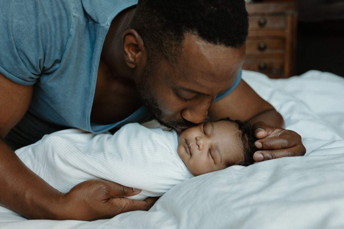 Derick Samuel with his baby daughter Bianca Rayne. Photo by Jessica Silveria.