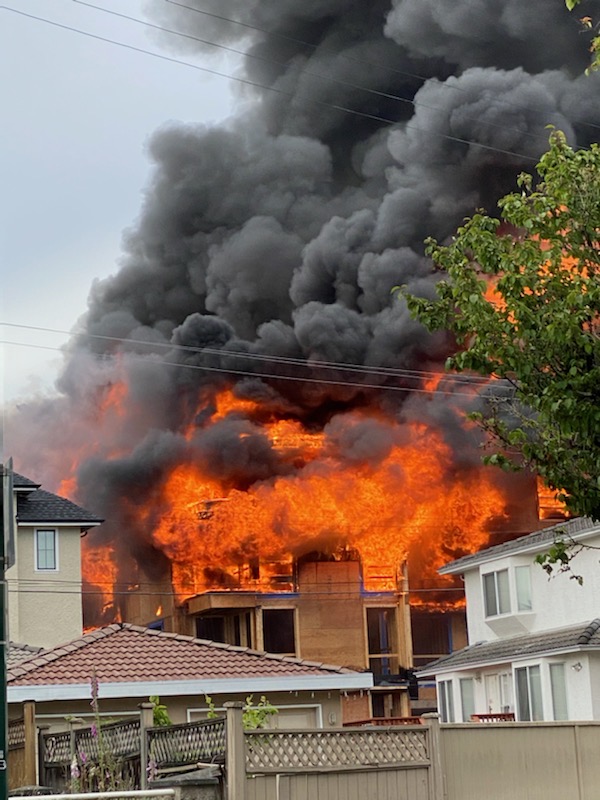 Massive, searing-hot fire destroys south Vancouver condo building under construction - image