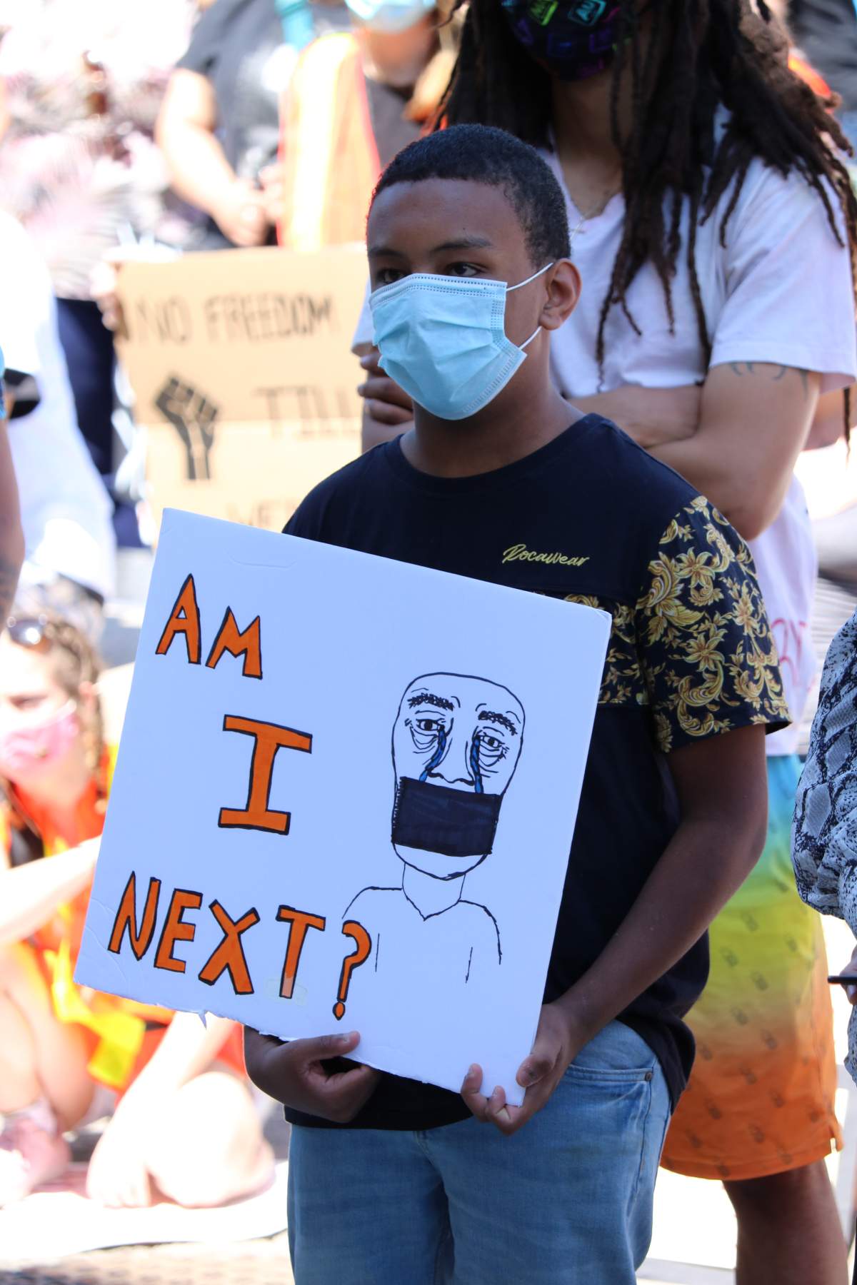 Young Black man at the Black Lives Matter rally in London Ontario on June 6, 2020.