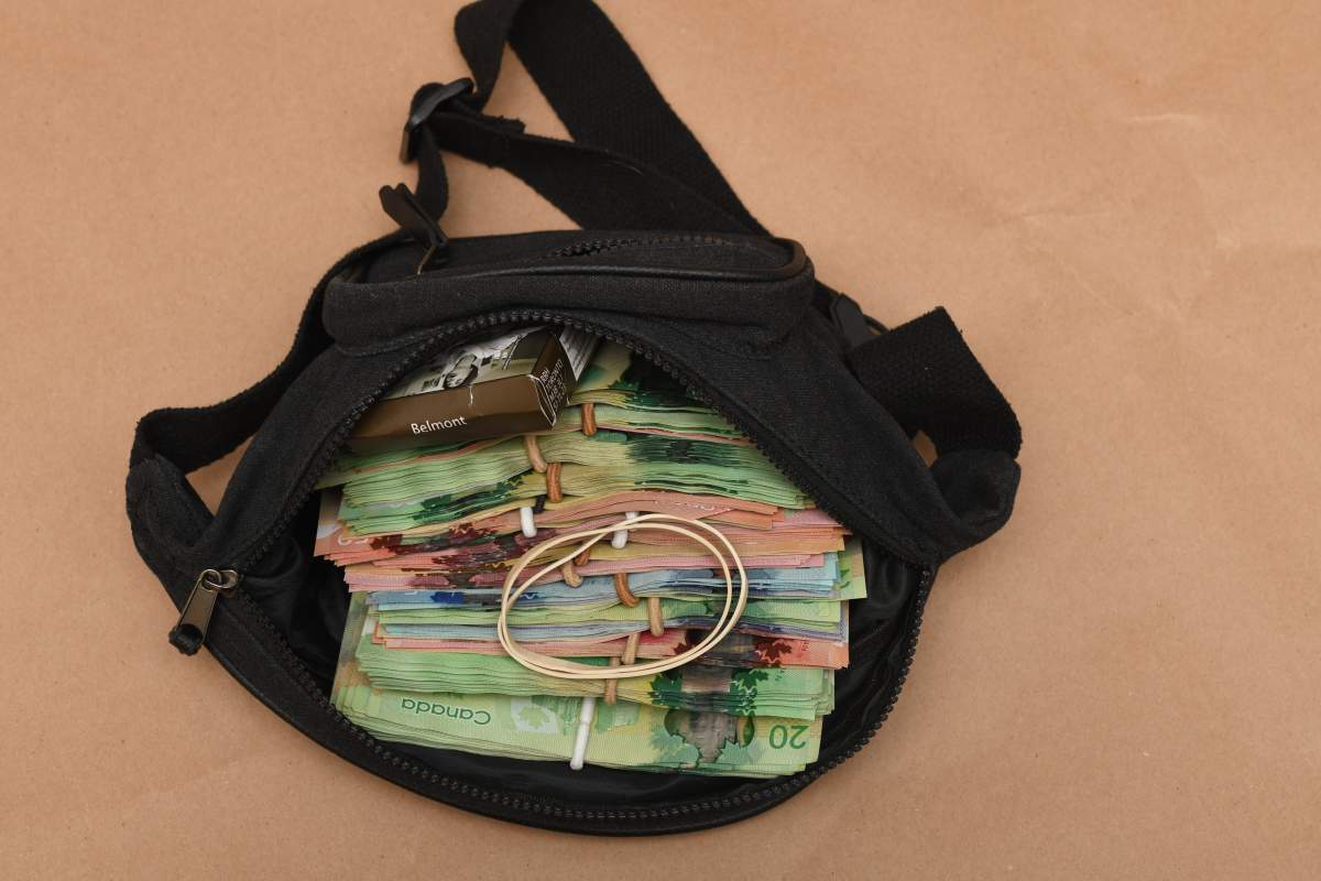 Police seized nearly $14,500 in cash as part of a drug investigation.