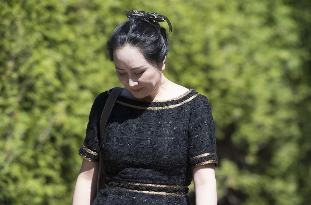 Meng Wanzhou, chief financial officer of Huawei, leaves her home to go to B.C. Supreme Court in Vancouver, Wednesday, May 27, 2020.