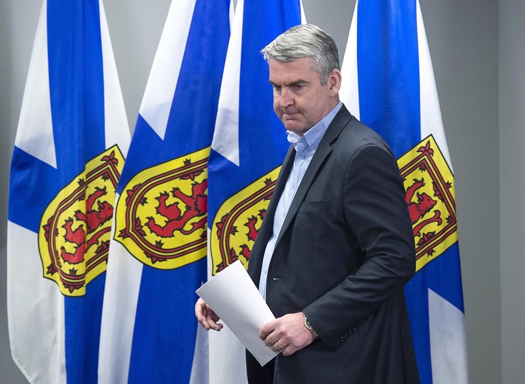 Premier Stephen McNeil arrives at a news conference in Halifax on Sunday, March 15, 2020.