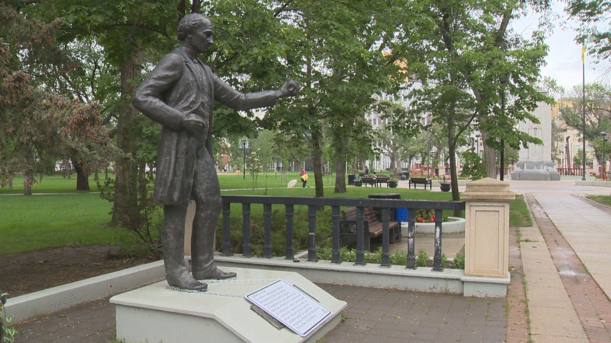 A sign hanging around the feet of the John A. Macdonald monument in Victoria Park Tuesday morning indicated the city has begun consultation with elders and community members.