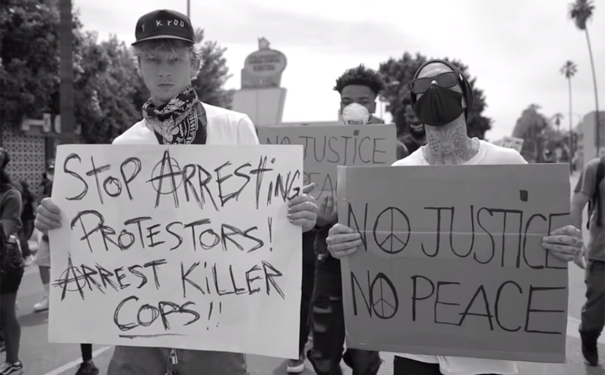 American rapper and rock musician Machine Gun Kelly and Blink-182 drummer Travis Barker during a Black Lives Matter protest in the U.S. in 2020.