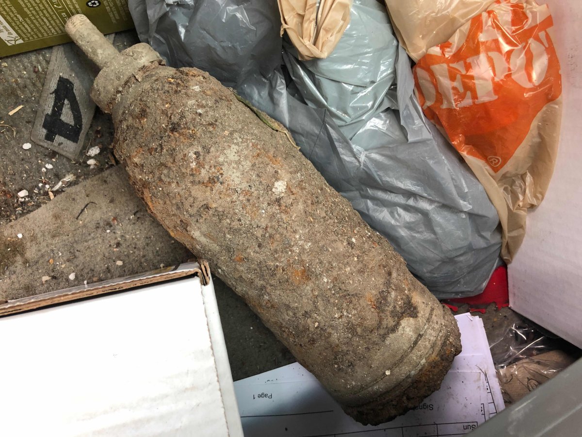 Kingston police were forced to close their main entrance after a resident brought in an old mortar they dug up.