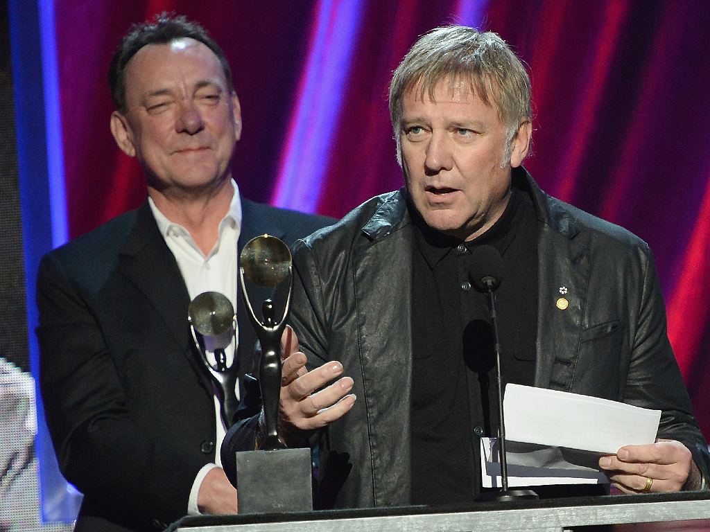 (L-R) The late Neil Peart and Alex Lifeson of Rush during the 28th Annual Rock and Roll Hall of Fame Induction Ceremony at the Nokia Theatre in Los Angeles, Calif. on April 18, 2013.