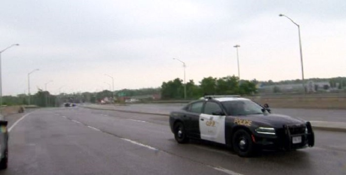 OPP say a woman was killed after being stuck by a vehicle while riding her bike on Tuesday in Oakville.