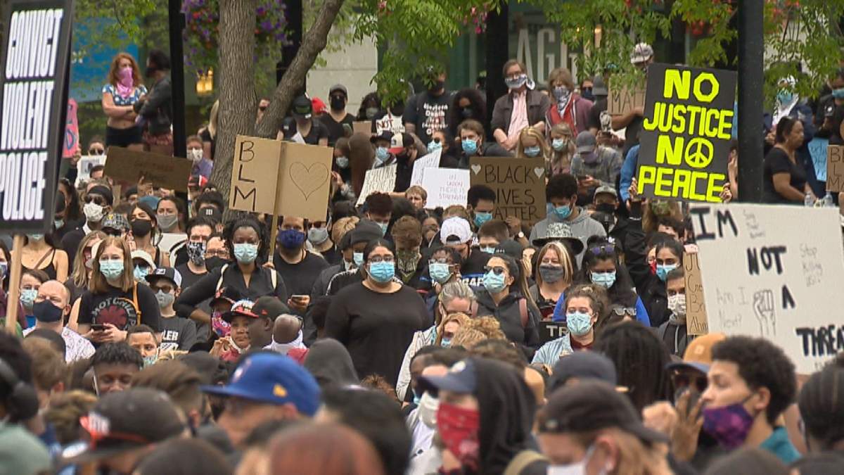 Calgarians turned out to stand in solidarity with Black Lives Matter at a rally in Olympic Plaza on Saturday, June 6, 2020.