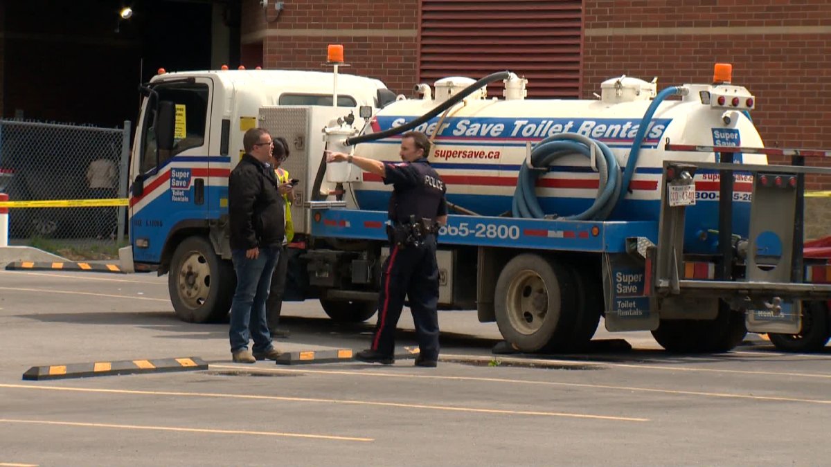 Calgary police on the scene of a crash involving a porta-potty truck in downtown Calgary. 