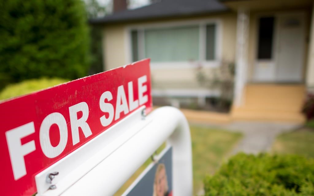 A real estate sign is pictured in Vancouver, B.C., Tuesday, June, 12, 2018. A new analysis of the country's stock of affordable housing suggests the Liberals' decade-long strategy to provide more of it is starting in a deeper hole than previously thought, and may be further behind once the COVID-19 pandemic passes.
