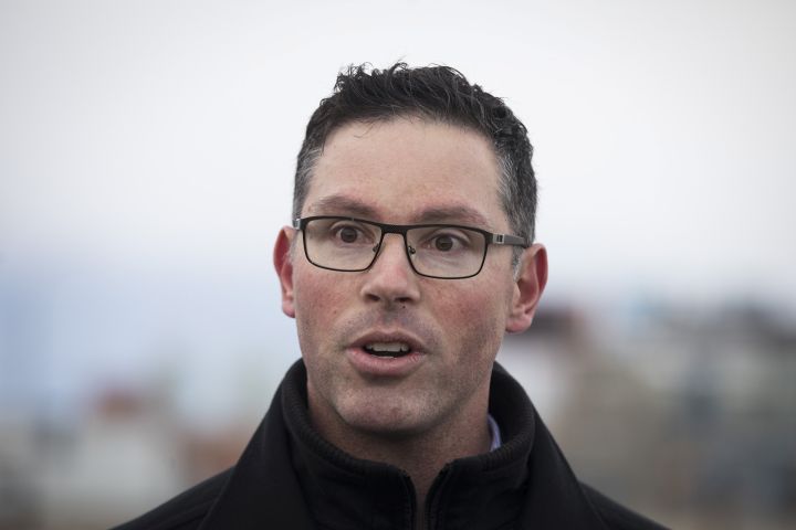 Alberta Minister of Justice and Solicitor General Doug Schweitzer makes a statement at a news conference in Calgary on December 31, 2019. A victim services group is concerned proposed new legislation could allow the Alberta government to raid a fund meant to help those hurt by crime. The United Conservative government introduced a bill last week that would expand the scope of the Victims of Crime Fund to include public safety initiatives. 