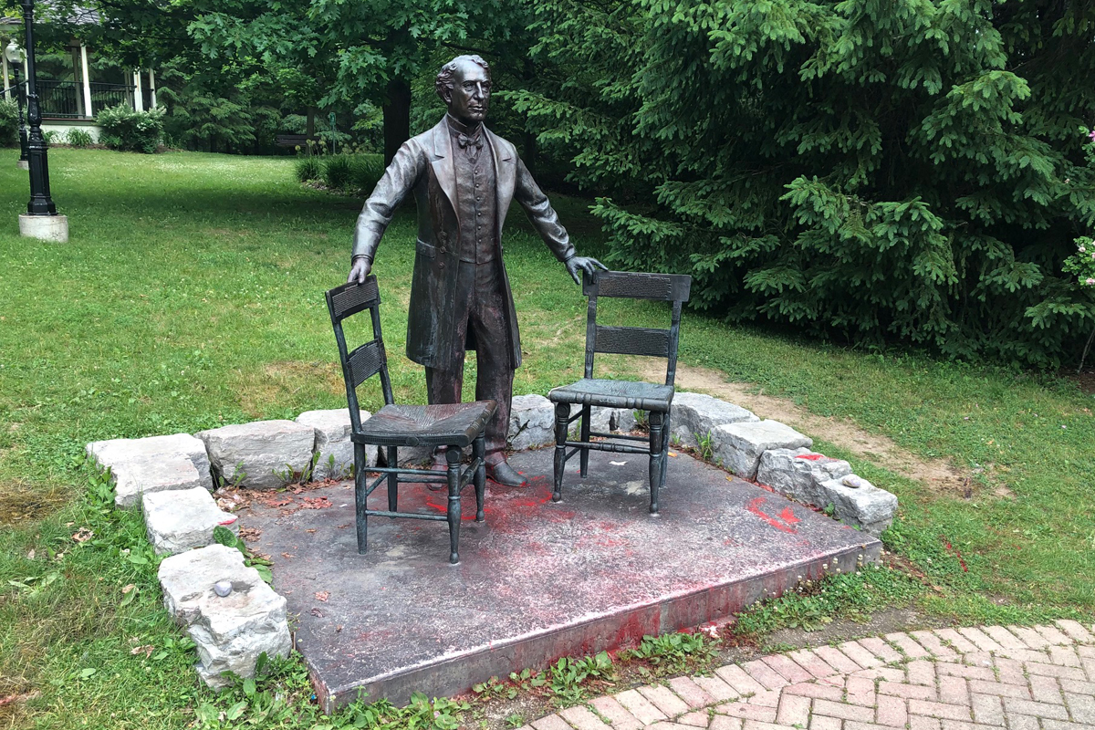 Red paint could still be seen Monday morning on the statue of Sir John A. Macdonald in Baden, Ont.