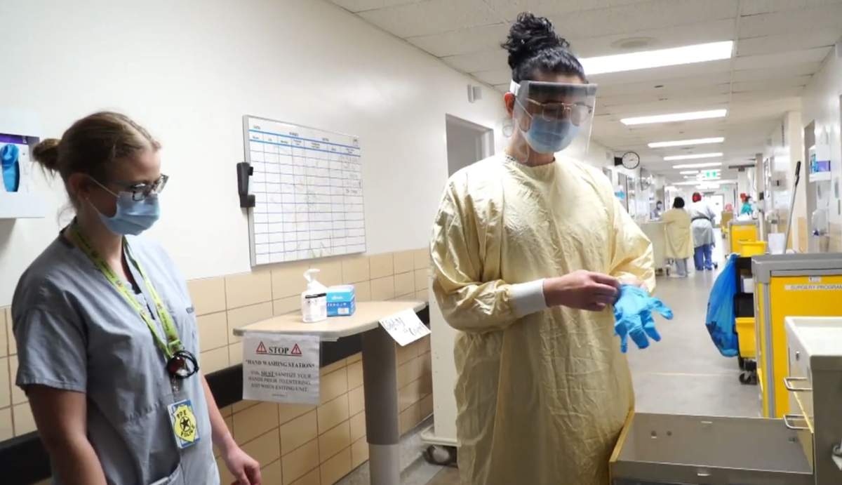 Staff putting on PPE inside the Royal Alexandra Hospital in Edmonton, Alta. on Tuesday, June 16, 2020.