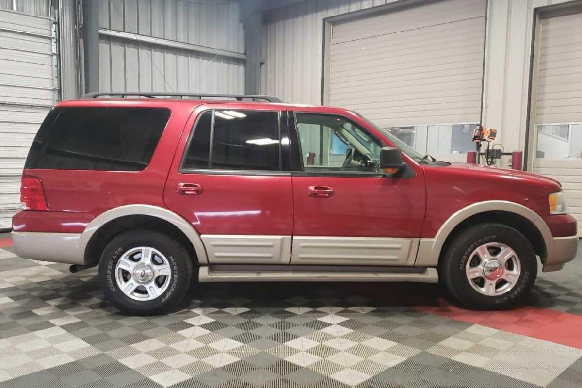 A file shot of a red Ford Expedition, similar to the suspect vehicle police are seeking.