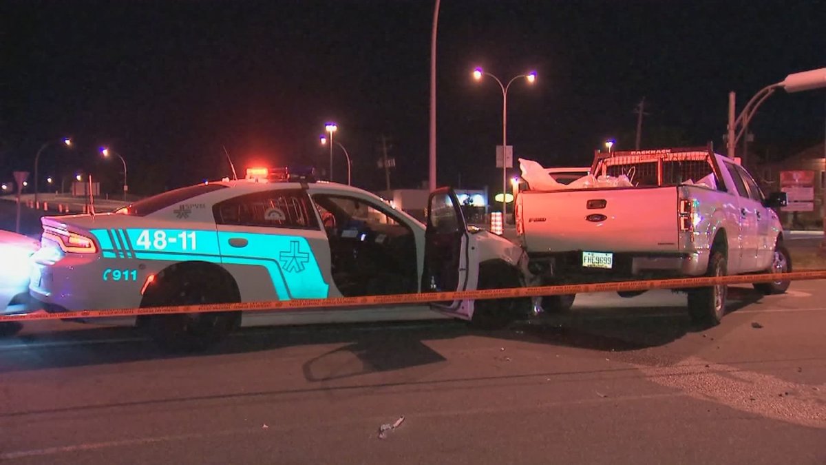 A Montreal police cruiser sits shortly after being hit by a vehicle during a police chase on the night of June 1, 2020.