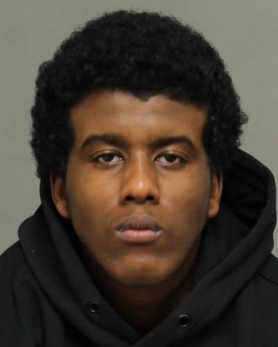 Abdullahi Abdullahi, 19, is now wanted on Canada-wide warrants for aggravated assault and five additional weapons offences.