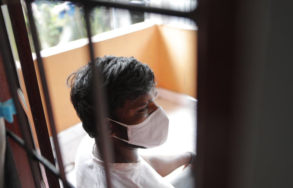 Sri Lankan auto rickshaw driver Prasad Dinesh, linked by Sri Lankan officials to nearly half the country's more than 2,600 coronavirus cases, sits in his house in Ja-Ela, Sri Lanka, Wednesday, July 1, 2020. For months he’s been anonymous, but now Dinesh is trying to clear his name and shed some of the stigma of a heroin addiction at the root of his ordeal. Referring to him only as “Patient 206,” government officials lambasted Dinesh on TV and social media, blaming him for at least three clusters of cases, including about 900 navy sailors who were infected after an operation in Ja-Ela, a small town about 19 kilometers (12 miles) north of the capital, Colombo. Dinesh, however, says his drug addiction, which is considered a crime in Sri Lanka, makes him a convenient scapegoat. 
