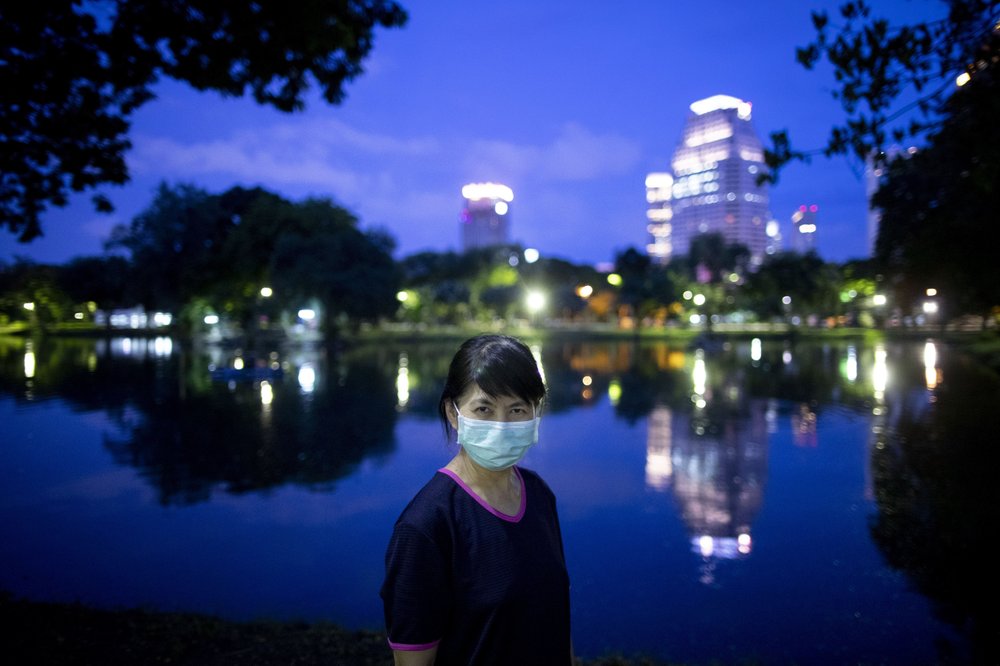 Nantaga Sanguannoi poses for photo during her evening walk at Lumpini park Bangkok, Thailand on Tuesday, July 21, 2020. Sanguannoi, works as a registered nurse in a hospital in Bangkok. “I want everyone to know it is easy to prevent spreading of COVID-19 by wearing a mask. Lot of resources have been utilized, and economies have been shattered because of the virus. If we can prevent spreading of the virus those resources can be utilized to help already affected poor people, think about it” said Sanguannoi.