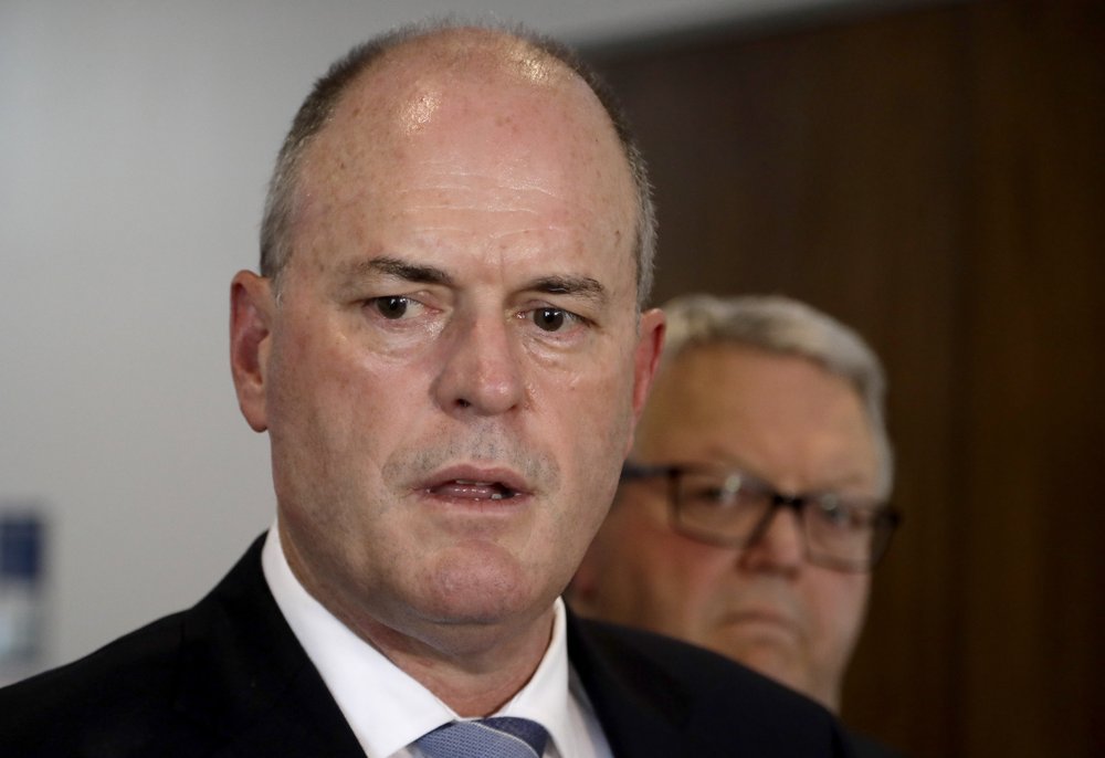 FILE - In this July 9, 2020 file photo, leader of New Zealand's opposition National Party, Todd Muller, addresses the media in Christchurch, New Zealand. Muller has quit Tuesday, July 14, 2020, citing health reasons just over two months from a general election and 53 days after taking charge in a leadership coup amid the party's stagnant poll numbers. 