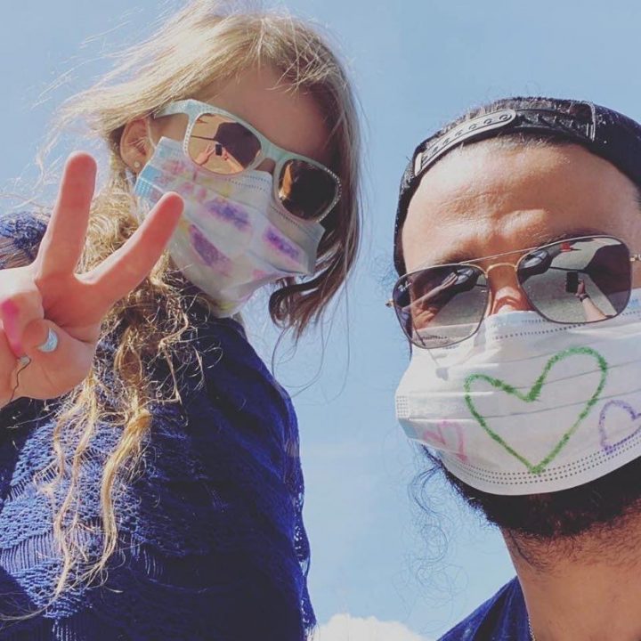 Dustin Gill poses with his 7-year-old daughter.