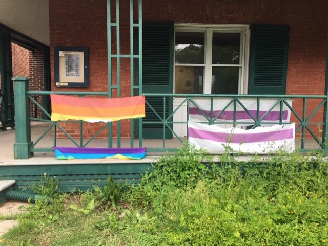 Kingston police have released images of the flags damaged outside of the Four Directions Indigenous Student Centre in late June. 