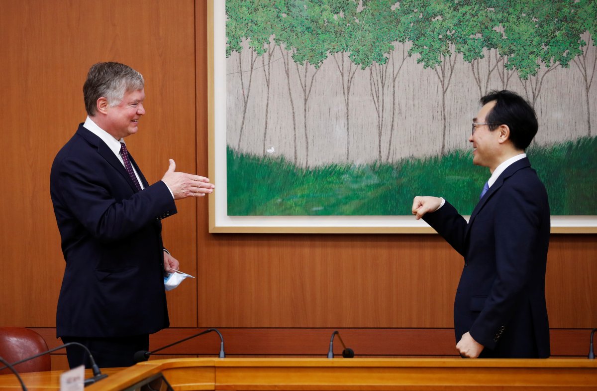 U.S. Deputy Secretary of State Stephen Biegun is greeted by his South Korean counterpart Lee Do-hoon during their meeting at the Foreign Ministry in Seoul, South Korea, July 8, 2020.   