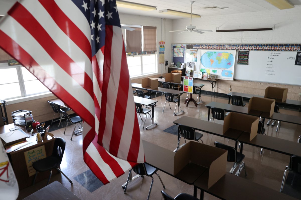 FILE PHOTO: Social distancing dividers for students are seen in a classroom at St. Benedict School, amid the outbreak of the coronavirus disease (COVID-19), in Montebello, near Los Angeles, California, U.S., July 14, 2020. 