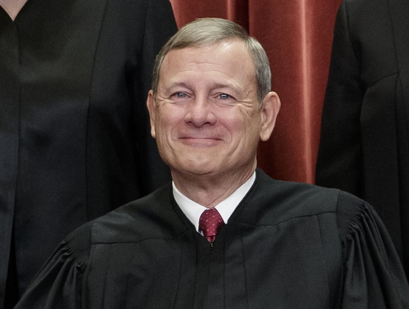 FILE - This Nov. 30, 2018, file photo shows Chief Justice of the United States, John Roberts, as he sits with fellow Supreme Court justices for a group portrait at the Supreme Court Building in Washington. Roberts spent the night in the hospital in June 2020 after he fell and injured his forehead, a Supreme Court spokeswoman confirmed Tuesday, July 7. 