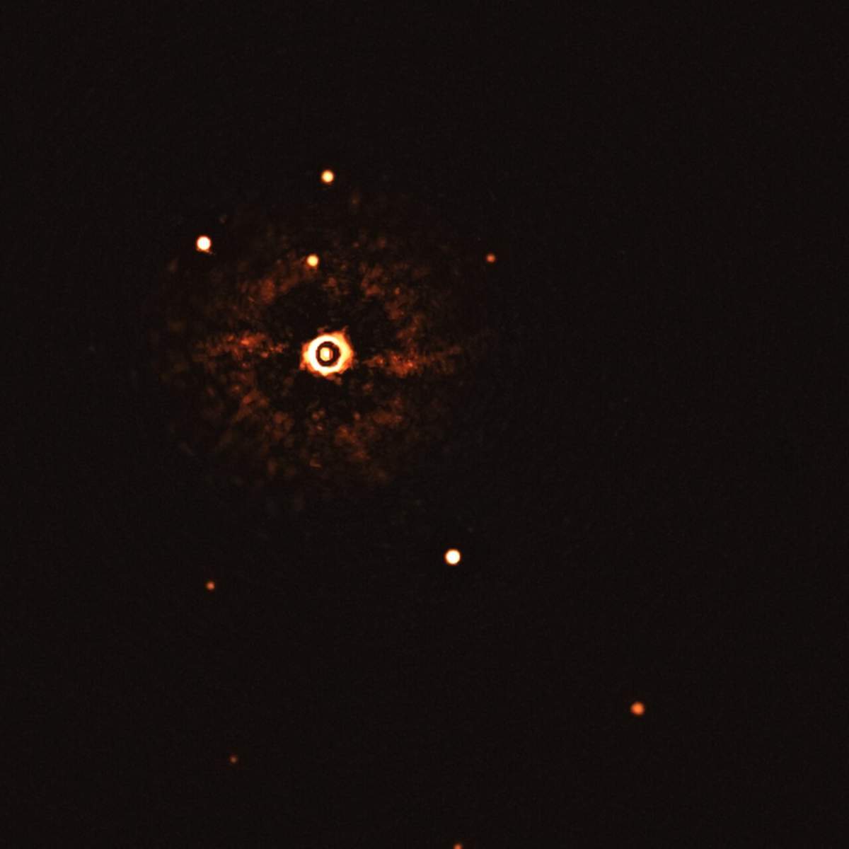 This image, captured by the SPHERE instrument on ESO’s Very Large Telescope, shows the star TYC 8998-760-1 accompanied by two giant exoplanets, TYC 8998-760-1b and TYC 8998-760-1c.