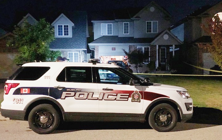 Guelph police block off a home on Beattie Street Friday night. 