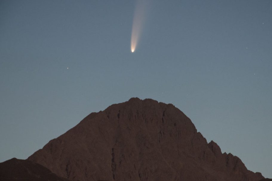 Comet NEOWISE is shown shining above Gran Sasso d’Italia pick (Corno Grande), in L’Aquila, Italy, on July 7, 2020.