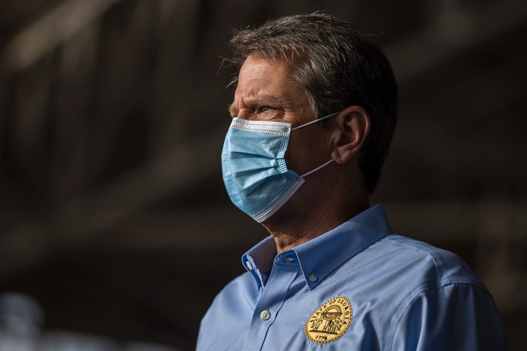 Georgia Governor Brian Kemp participates in a press conference before embarking on a two-day 'Wear a Mask' fly around tour of the state, at Peachtree Dekalb Airport in Atlanta, Georgia, USA, 01 July 2020. Georgia, like many states in the Southern US, continues to see an upward spike in coronavirus COVID-19 positive cases and hospitalizations. Kemp is encouraging all to wear a face mask in public, but has not issued a mandatory order.  