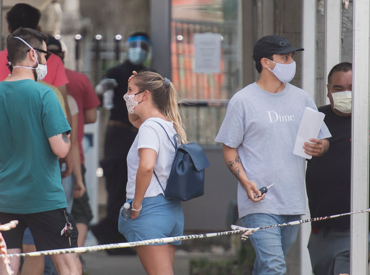 People are shown at a coronavirus testing clinic in Montreal, Sunday, July 12, 2020, as the COVID-19 pandemic continues in Canada and around the world.
