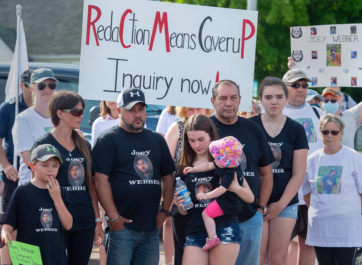 Family and friends of victim Joey Webber attend a march demanding an inquiry into the April mass shooting in Nova Scotia that killed 22 people, in Bible Hill, N.S. on Wednesday, July 22, 2020. THE CANADIAN PRESS/Andrew Vaughan