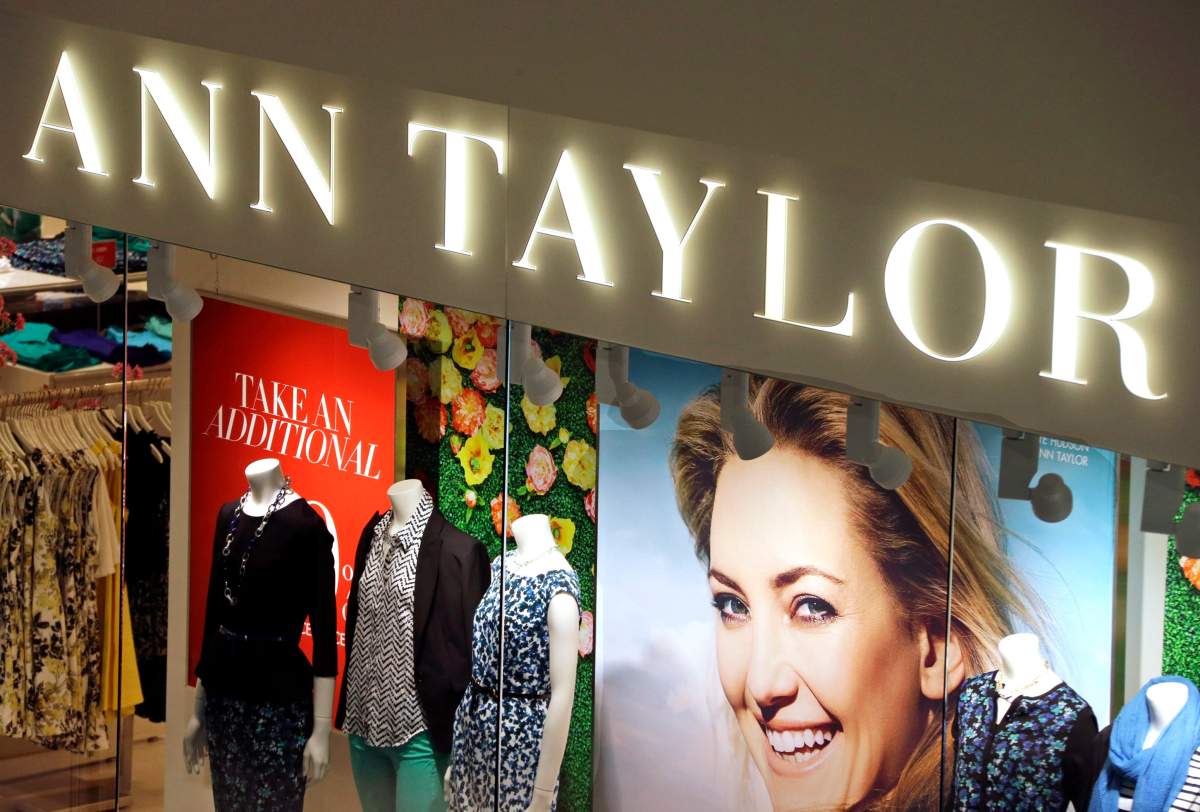 This March 5, 2013 file photo shows an Ann Taylor store in Mount Lebanon, Pa. The parent company of Ann Taylor, Loft and Justice says it will close all of its stores in Canada. 