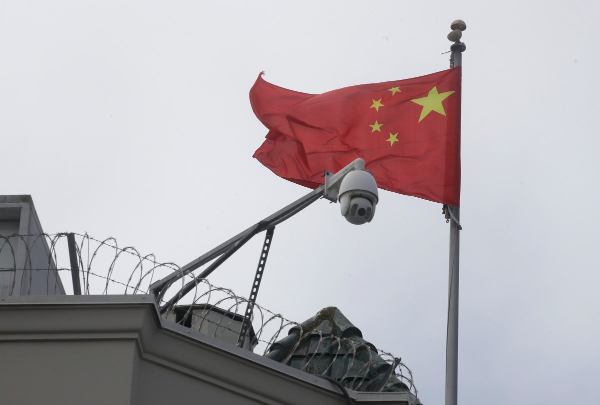 The flag of China flies behind a security camera over the Chinese Consulate in San Francisco, Thursday, July 23, 2020.